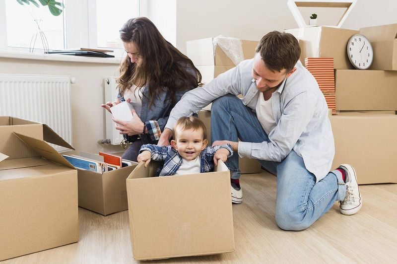 A family packing cartons during a house shifting job in Coimbatore