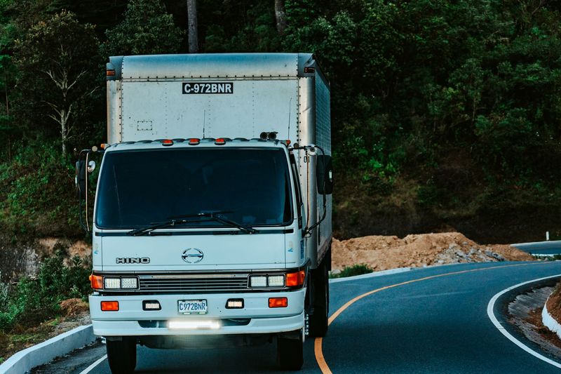 Closed-body transport lorry used for car and bike transport from Coimbatore